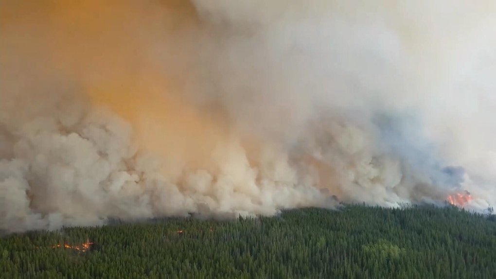 A wildfire burns in the Cariboo district in a 2017 file photo.