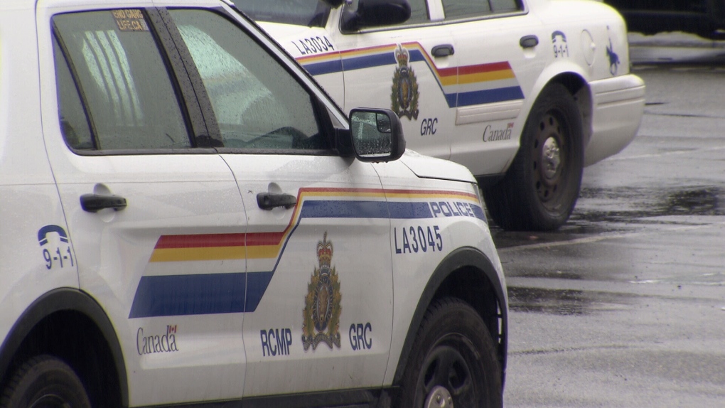A file photo shows two RCMP vehicles in Coquitlam, B.C. 