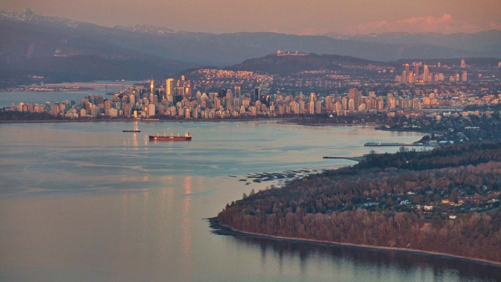 The Vancouver skyline is pictured from the air at sunset. (Pete Cline / CTV News Vancouver)