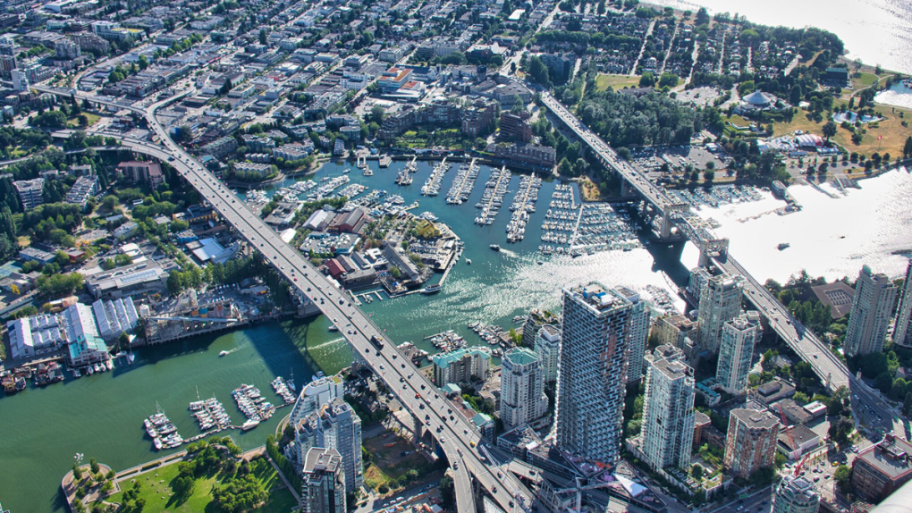 The Burrard Bridge and Granville Street Bridge are seen from the air in June 2019. (Pete Cline / CTV News Vancouver)