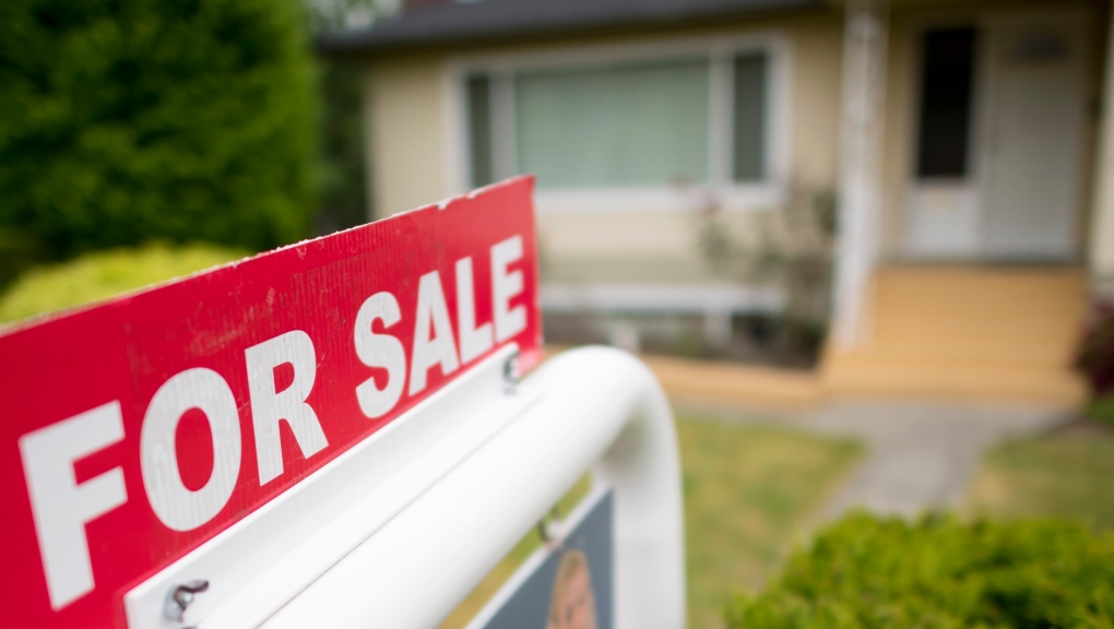 A real estate sign is pictured in Vancouver, B.C., Tuesday, June, 12, 2018. THE CANADIAN PRESS Jonathan Hayward