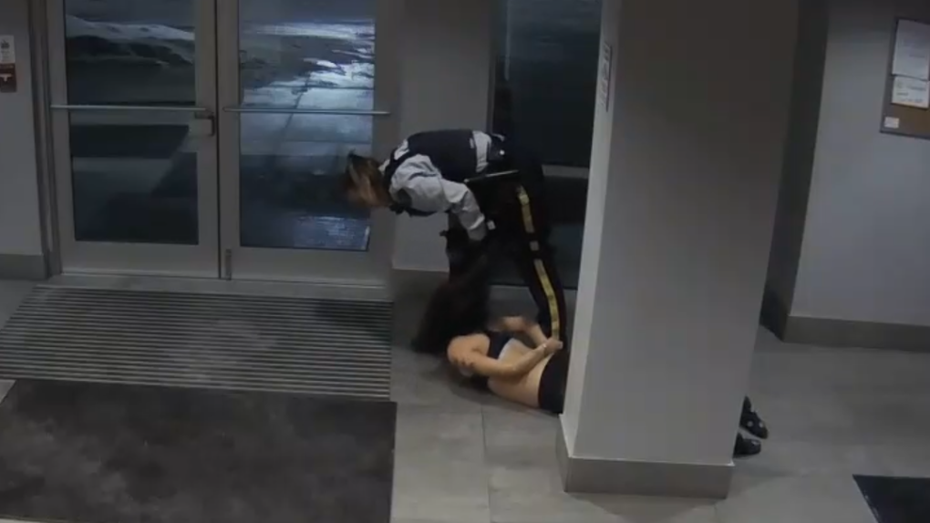 Video obtained by CTV News shows Mona Wang lying on the ground as Const. Lacy Browning stands over her during an incident at her Kelowna, B.C., apartment building on Jan. 20, 2020. 