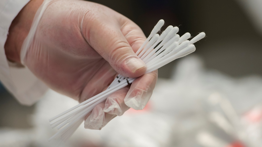 Dual COVID-19 testing swab kits are seen in Oakville, Ont., on Monday, June 8, 2020. (Nathan Denette / THE CANADIAN PRESS)