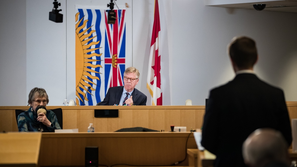 Commissioner Austin Cullen, back centre, listens to introductions before opening statements at the Cullen Commission of Inquiry into Money Laundering in British Columbia, in Vancouver, on Monday, Feb. 24, 2020. (Darryl Dyck / THE CANADIAN PRESS)