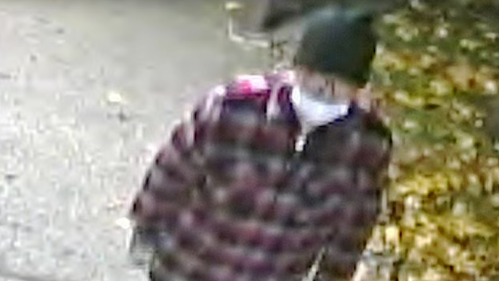 A suspect in the Burnaby Hospital fire is pictured in a still image from surveillance camera video released by the Burnaby RCMP.