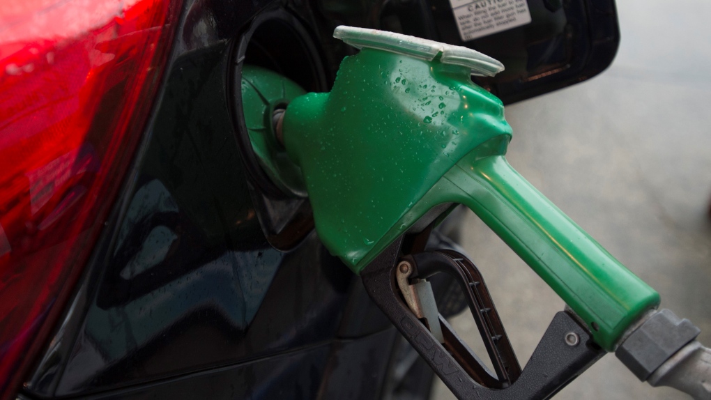 A car is fuelled up at a gas station in Vancouver, Wednesday, July 17, 2019. (Jonathan Hayward / THE CANADIAN PRESS)