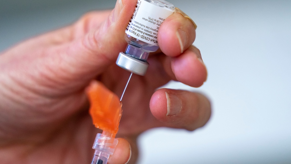 File image: A syringe is loaded with COVID-19 vaccine at a clinic in Richmond, B.C., on Saturday, April 10, 2021. (THE CANADIAN PRESS/Jonathan Hayward)