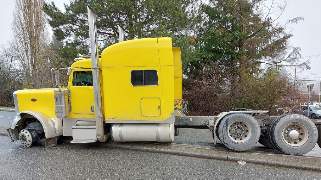 Abbotsford Police say that a man is custody after stealing and crashing a semi-truck in Abbotsford, B.C., on Saturday, June 15, 2022. (Police handout photo)