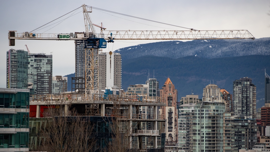 A crane sits idle at a downtown Vancouver construction site on Saturday, January 9, 2021. THE CANADIAN PRESS/Darryl Dyck