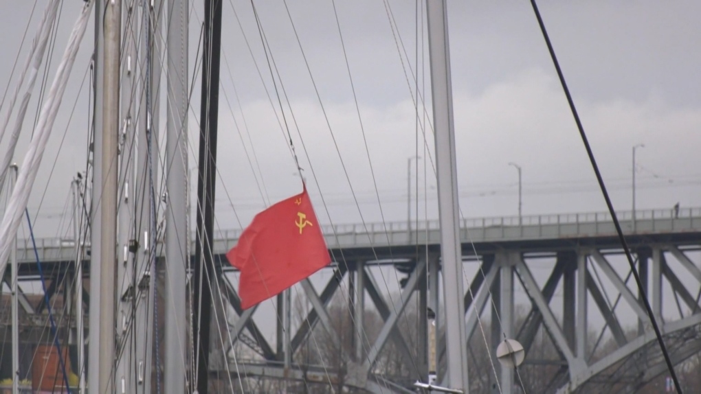 A Soviet Union flag flying on the mast of a boat moored in Vancouver has sparked outrage among local Ukrainians.