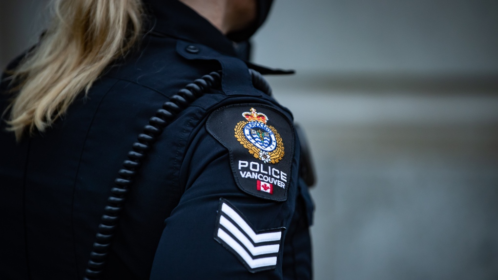 A Vancouver Police Department patch is seen on an officer's uniform as she makes a phone call after responding to an unknown incident on Saturday, January 9, 2021. THE CANADIAN PRESS/Darryl Dyck
