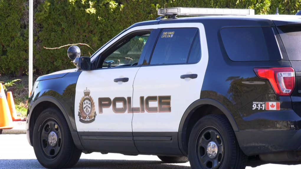 A West Vancouver police cruiser is parked by the scene of a house fire and alleged discovery of a drug lab on March 9, 2022. 