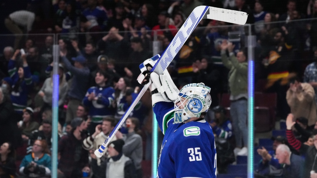 Vancouver Canucks goalie Thatcher Demko celebrates after Vancouver defeated the San Jose Sharks during an NHL hockey game in Vancouver, on Saturday, April 9, 2022. THE CANADIAN PRESS/Darryl Dyck