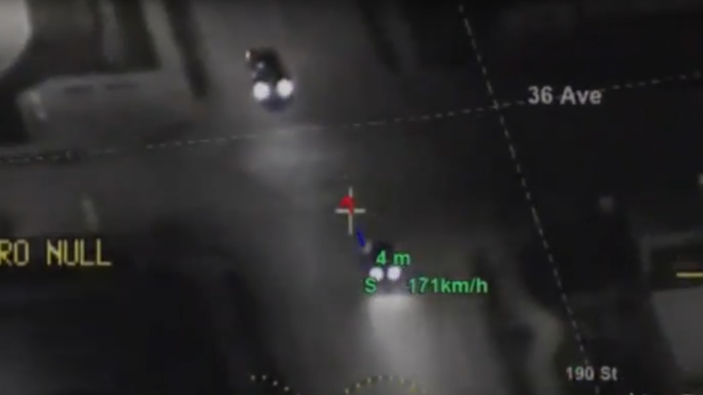 A still image from video released by the Surrey RCMP shows a speeding vehicle seen from the air.