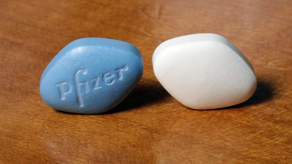 This Monday, Dec. 4, 2017 photo shows a tablet of Pfizer's Viagra, left, and the company's generic version, sildenafil citrate, at Pfizer Inc., headquarters in New York. (AP / Richard Drew) 