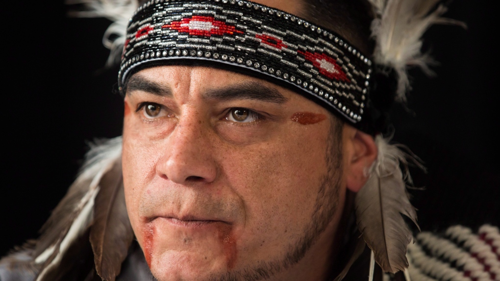 William George, a member of the Tsleil-Waututh First Nation and a guardian at the watch house near the Trans Mountain pipeline's Burnaby facility, pauses while speaking during a news conference with Indigenous leaders and politicians opposed to the expansion in Vancouver, B.C., on Monday, April 16, 2018. THE CANADIAN PRESS/Darryl Dyck 