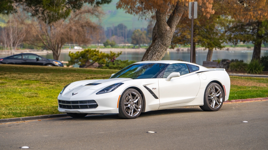 White Chevrolet Corvette parked on the road. (Shutterstock) 