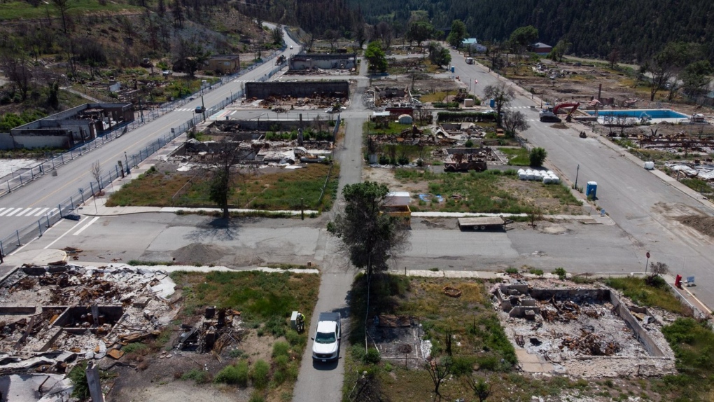 Structures that were destroyed by wildfire are seen in Lytton, B.C., on Tuesday, June 14, 2022. The fire-ravaged community of Lytton, B.C., will get $21 million from the provincial government to help it rebuild essential infrastructure and services. THE CANADIAN PRESS/Darryl Dyck
