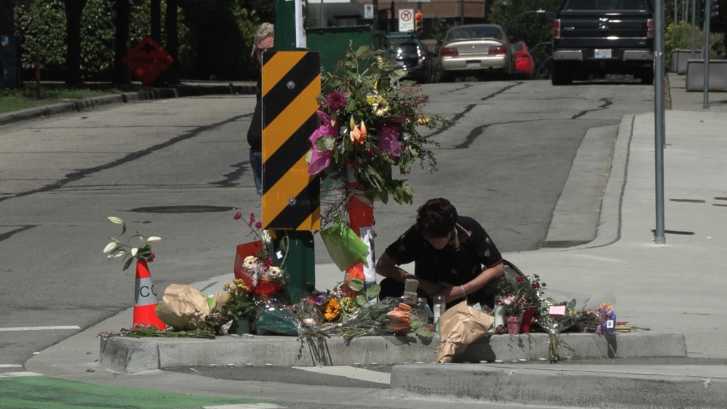 A memorial is seen at Pacific and Hornby streets in downtown Vancouver, where a 28-year-old cyclist was killed on June 29, 2022. 