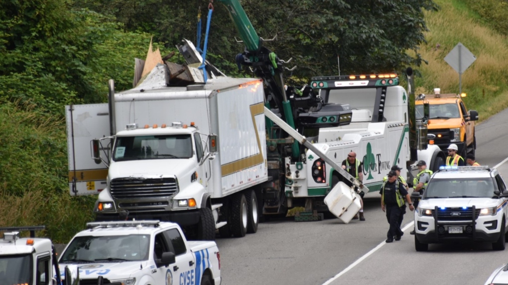 A truck carrying a "cherry picker" crashed into an overpass on Highway 1 on Monday, July 18, 2022. 