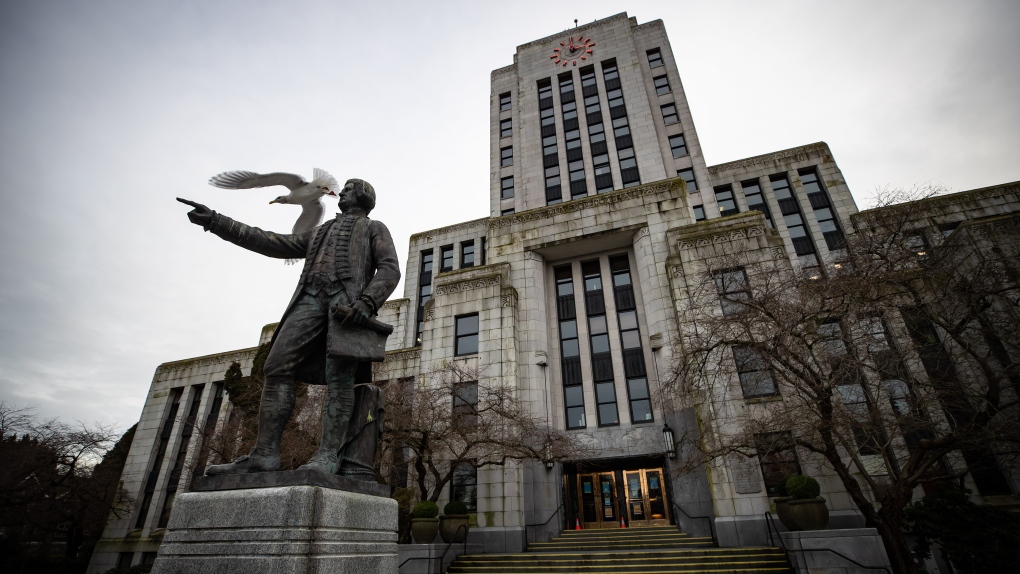 A seagull takes flight off a statue of Captain George Vancouver outside Vancouver City Hall, on Saturday, January 9, 2021. THE CANADIAN PRESS/Darryl Dyck 