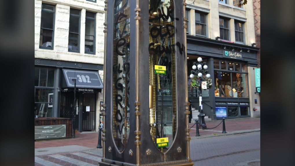 The Gastown Steam Clock in Vancouver is seen spray-painted with slogans in this image provided by the Save Old Growth activist group on Thursday, July 28, 2022. THE CANADIAN PRESS/HO-Save Old Growth
