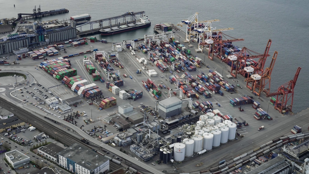 Cargo containers and ships at the Port of Vancouver are seen in an aerial view in Vancouver, on Saturday, April 9, 2022. THE CANADIAN PRESS/Darryl Dyck 