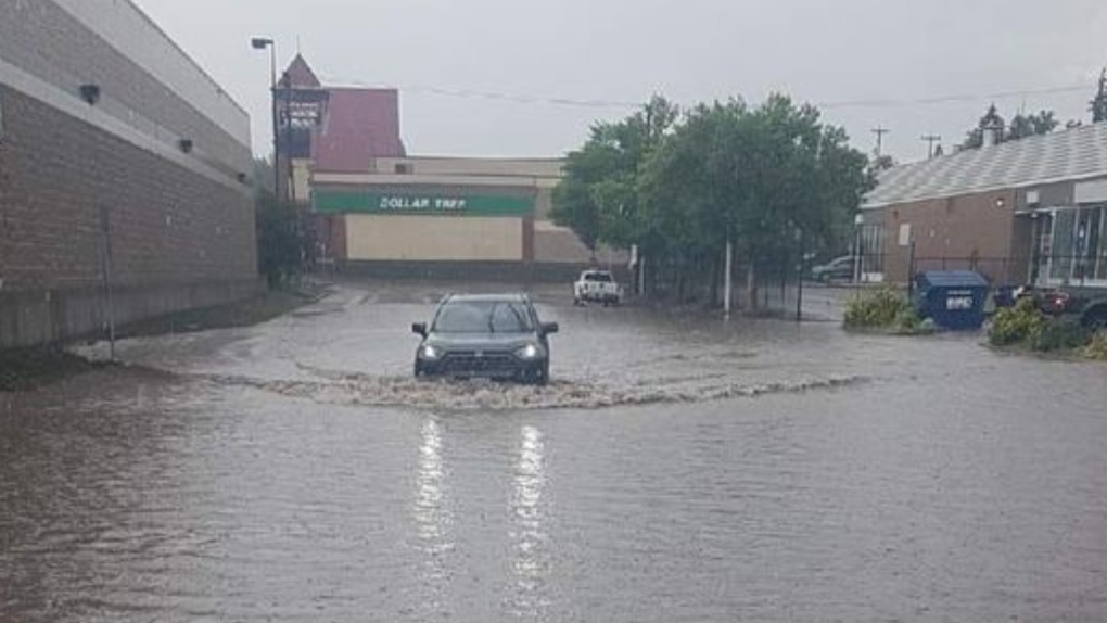 A flooded street is seen in Prince George, B.C., during an intense storm. (Facebook/Alison Hudyma) 
