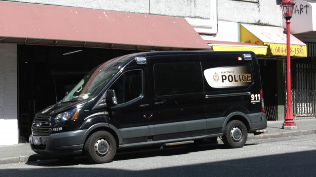 A Vancouver Police Department van is parked near Main and Keefer streets on Sunday, Aug, 14, 2022. 
