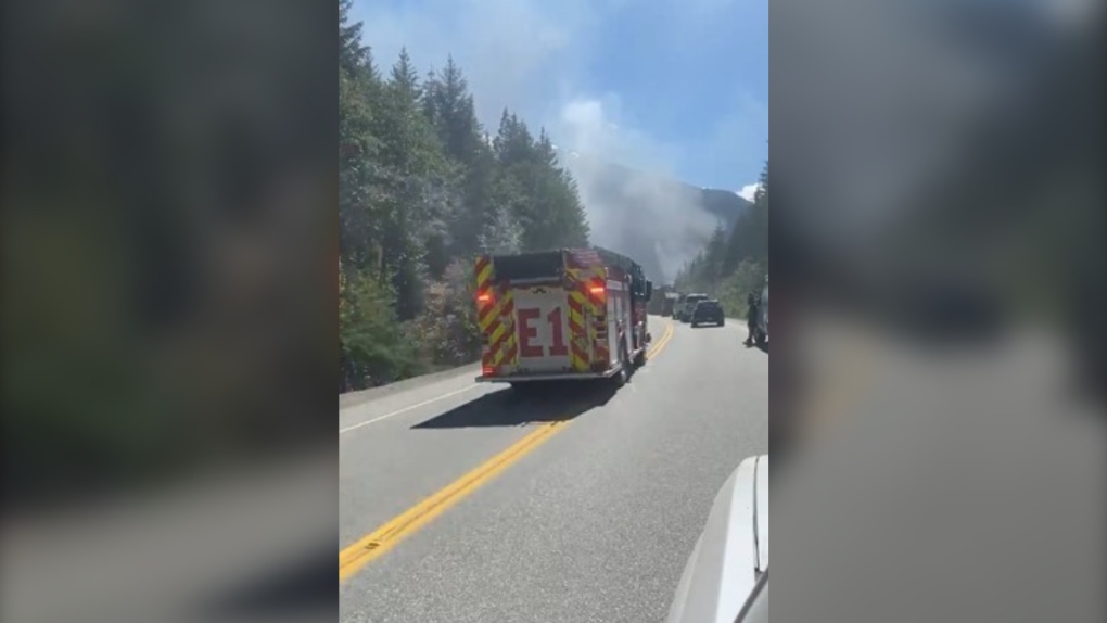 A fire truck is seen on Highway 99 between Whistler and Pemberton, where a vehicle caught fire Tuesday afternoon. (Facebook/Eelco de Zwaan)