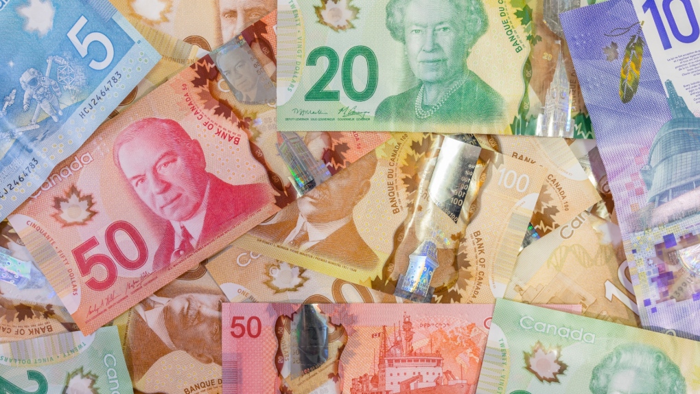 Canadian cash is shown. (Shutterstock.com)