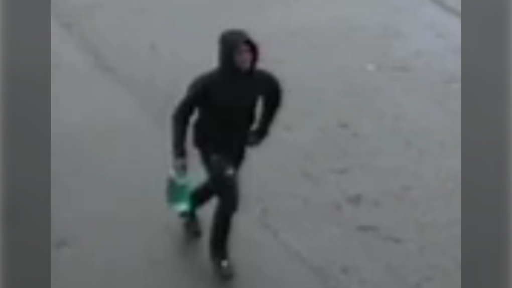 Mounties said the suspect photo they released is "not of great quality," but they're hoping someone will recognize the man from his clothing and bag. (Surrey RCMP)