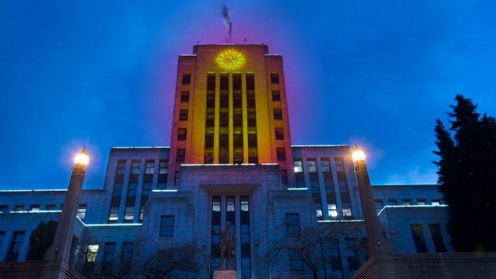 Yellow lights are shining at Vancouver City Hall to mark International Holocaust Remembrance Day on Jan. 27, 2023. (Twitter)