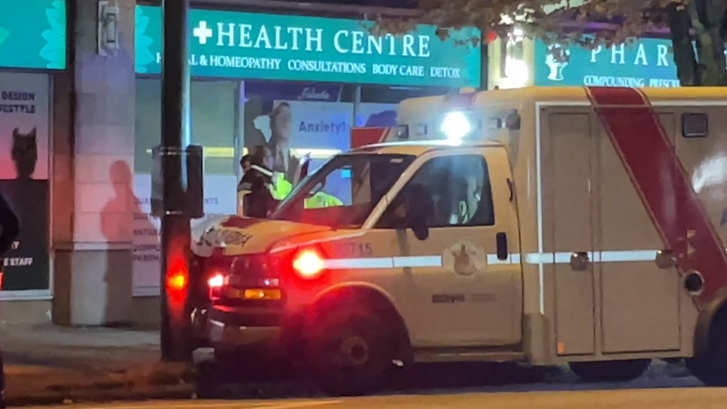 An ambulance is seen after colliding with a street lamp on Tuesday morning. 