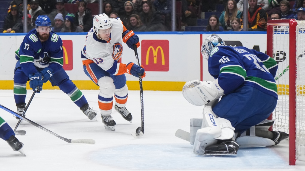 Canucks claw out 43 overtime win over Islanders CTV News