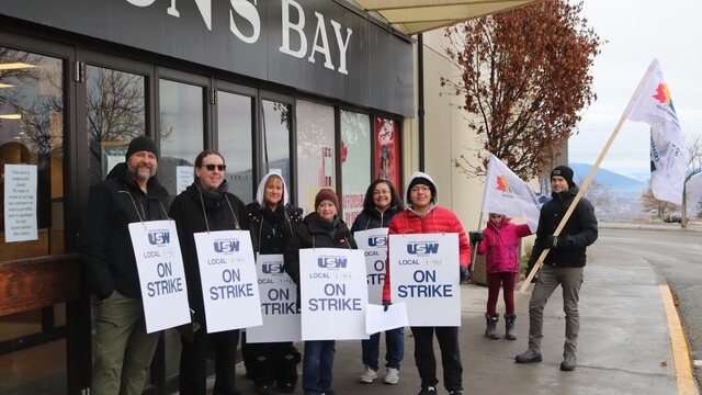 Striking workers are pictured outside the Hudson's Bay Company in Kamloops on Sunday, Dec. 10. (Image credit: Josh Dawson/Castanet) 