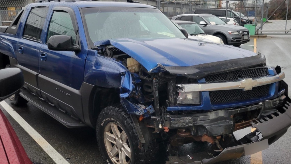 This photo shared on Twitter by the VPD shows damage to a truck whose driver allegedly crashed into two parked cars while drunk. 
