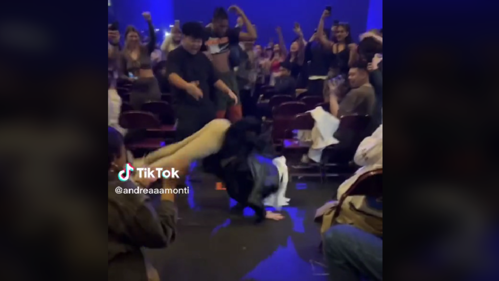This screen grab from a video posted to TikTok shows a man who was reportedly kicked out of a concert at Vancouver's Rogers Arena because he refused to stop dancing in the aisles. (credit: TikTok/@andreaaamonti)