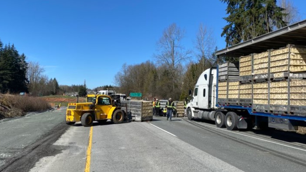 An incident involving a truck carrying chickens forced the closure of Highway 1 in Langley on Monday, March 27, 2023. (Image credit: Twitter/MainroadLM)