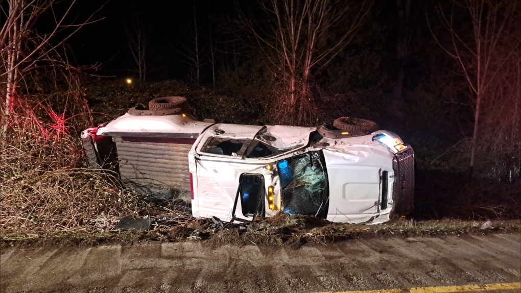 A white pick-up truck is seen rolled onto its side after the 37-year-old man who was behind the wheel was involved in a single-vehicle collision. Abbotsford police say the motorist was impaired, issued a 90 day driving ban and had his vehicle impounded for 30 days. (Sgt. Paul Walker, AbbyPD)