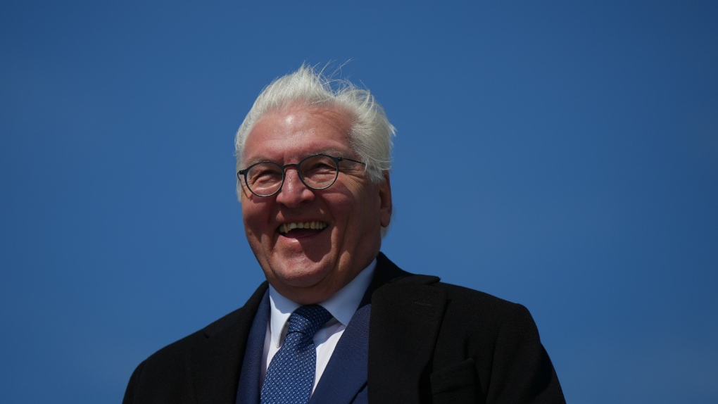 German President Frank-Walter Steinmeier laughs while touring the harbour on a boat and viewing port operations, in Vancouver, on Tuesday, April 25, 2023. THE CANADIAN PRESS/Darryl Dyck