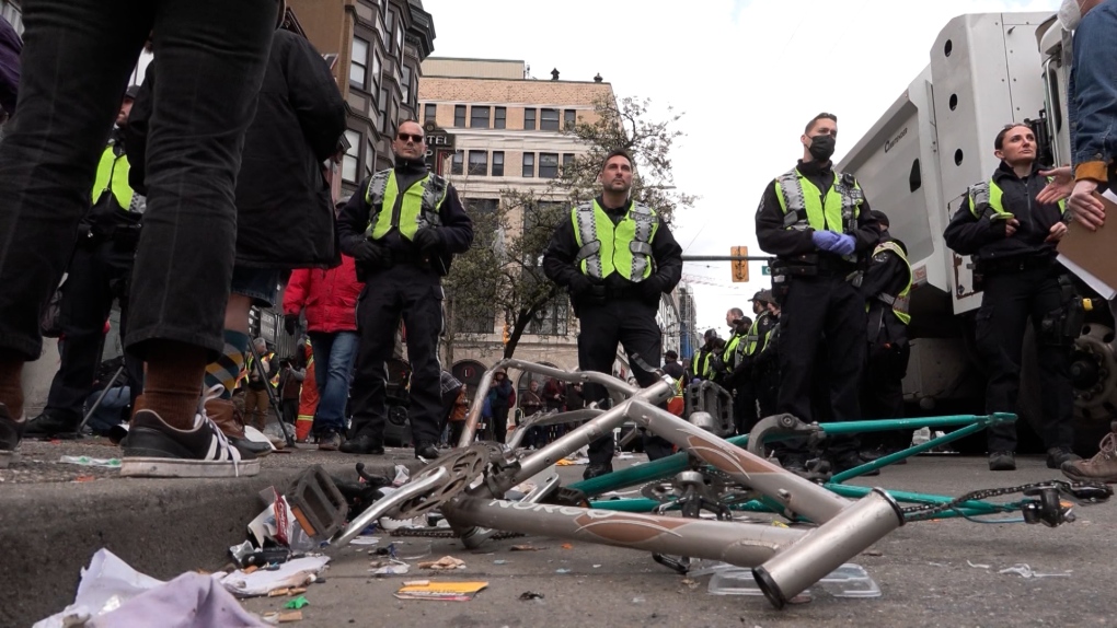 Vancouver workers, supported by police, dismantled a tent encampment along Hastings Street in the Downtown Eastside on Wednesday, April 5, 2023. (CTV)