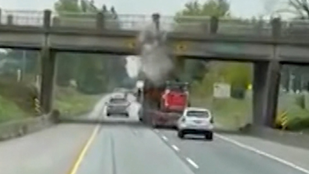 Truck Slams Into Overpass