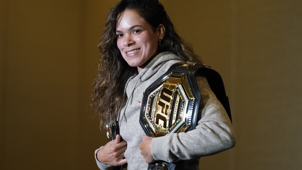 Amanda Nunes poses for a photographs during a news conference ahead of her fight against Irene Aldana at UFC 289, in Vancouver, B.C., Wednesday, June 7, 2023. THE CANADIAN PRESS/Darryl Dyck