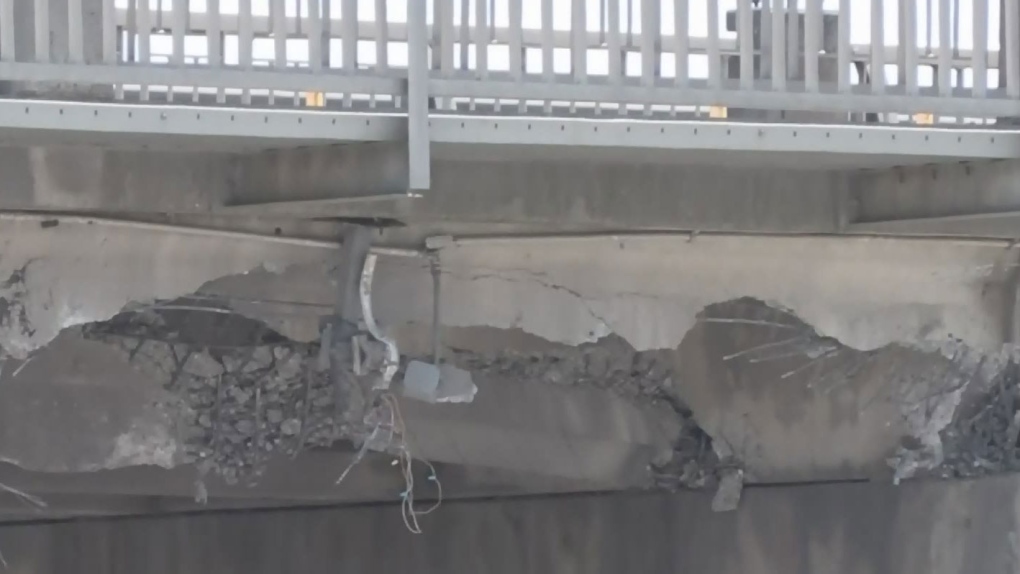 Truck hits overpass on Highway 99 