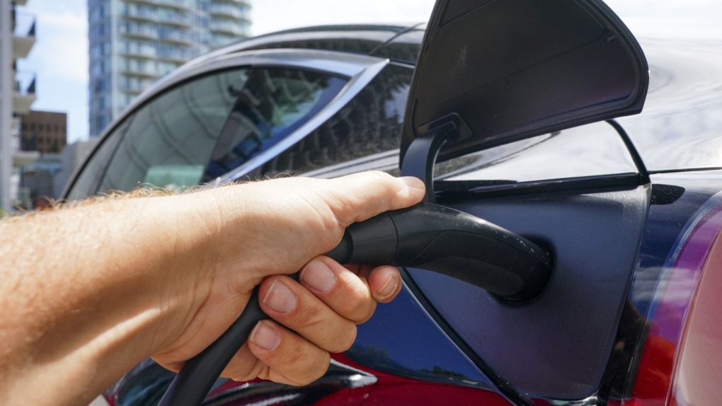 An electric vehicle is charged in Ottawa on Wednesday, July 13, 2022. BC Hydro wants to raise rates at public electric vehicle charging stations by 15 per cent from Sept. 1, which the company says would allow it to recover the costs of providing them over 10 years. THE CANADIAN PRESS/Sean Kilpatrick