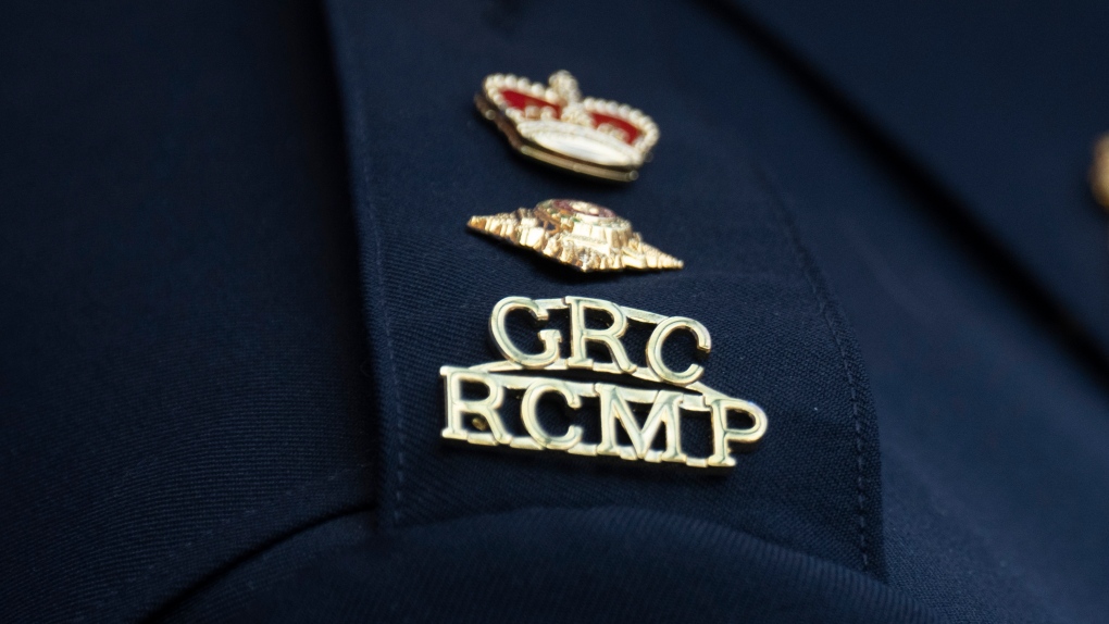 The RCMP logo is seen on the shoulder of a superintendent during a news conference, Saturday, June 24, 2023 in St. John’s, Newfoundland. Mounties in central Alberta say one of their officers has been charged with theft. THE CANADIAN PRESS/Adrian Wyld