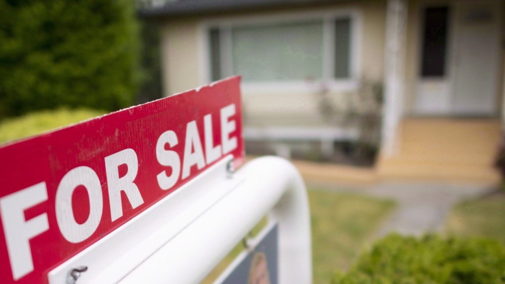 A real estate sign is pictured in Vancouver on Tuesday, June 12, 2018. THE CANADIAN PRESS Jonathan Hayward