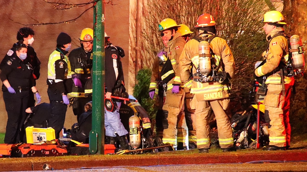First responders at the scene of a fire in East Vancouver on Sunday, Feb. 11. 