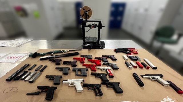 The Combined Forces Special Enforcement Unit provided this photo of items seized during a firearms investigation. 